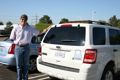 IRWD employee Alex Harris drives a Ford Escape Hybrid, part of the District's green fleet.
